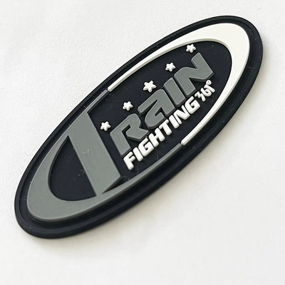 Étiquette de logo 3D en caoutchouc personnalisé PVC en relief gravé patch en caoutchouc