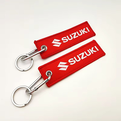 Emballage sur mesure Jet Tag en gros Réservoir de clés en tissu promotionnel porte-clés brodé