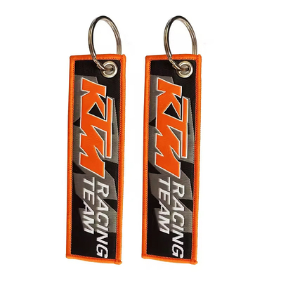 Logo personnalisé Cadeaux promotionnels Jet Tag Tissu Broderie Chaînes de voiture Chaînes de clés tissées