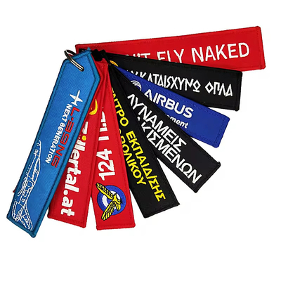 Logo personnalisé cadeau promotionnel porte-clés en tissu tissé à double face bordure porte-clés de vol
