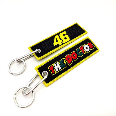 Logo personnalisé Cadeaux promotionnels Jet Tag Tissu Broderie Chaînes de voiture Chaînes de clés tissées